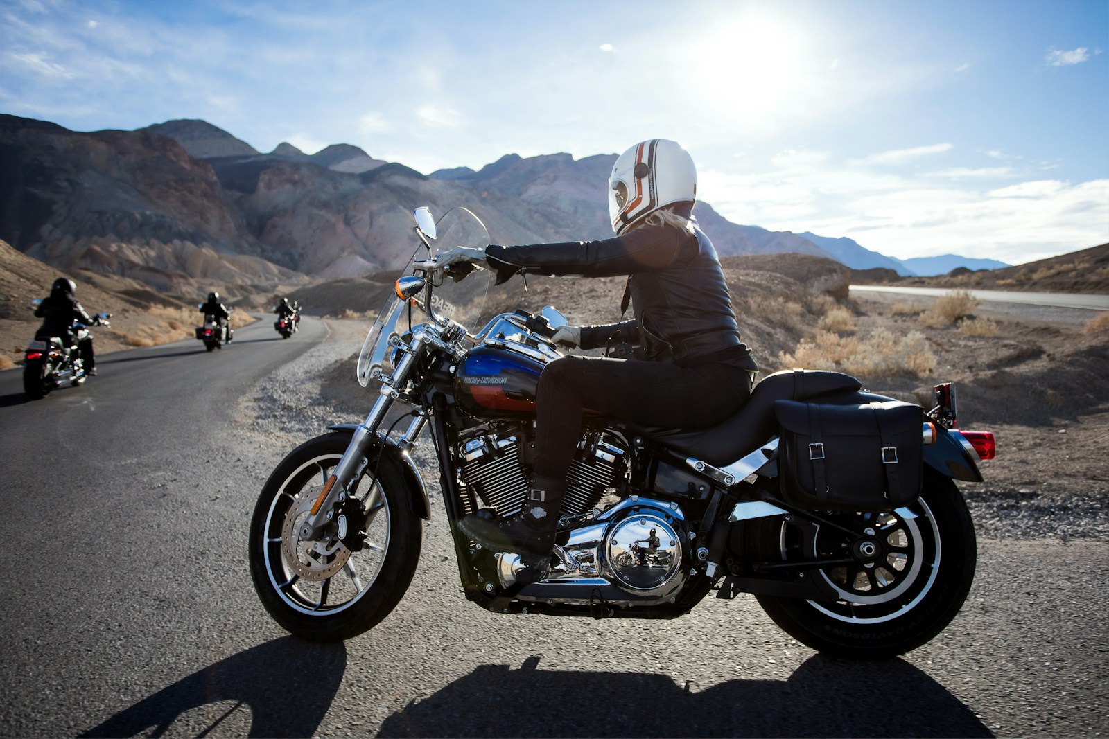 man riding touring motorcycle during daytime, motorcycle